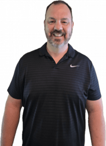 Professional headshot of the blog’s author, a work-from-home entrepreneur expert, dressed in a sleek black golf shirt, exuding confidence and approachability.